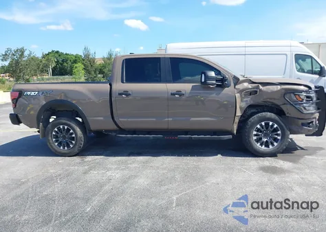 2022 Nissan Titan Xd Pro-4X 4X4 from USA, damaged, VIN 1N6AA1FBXNN100016